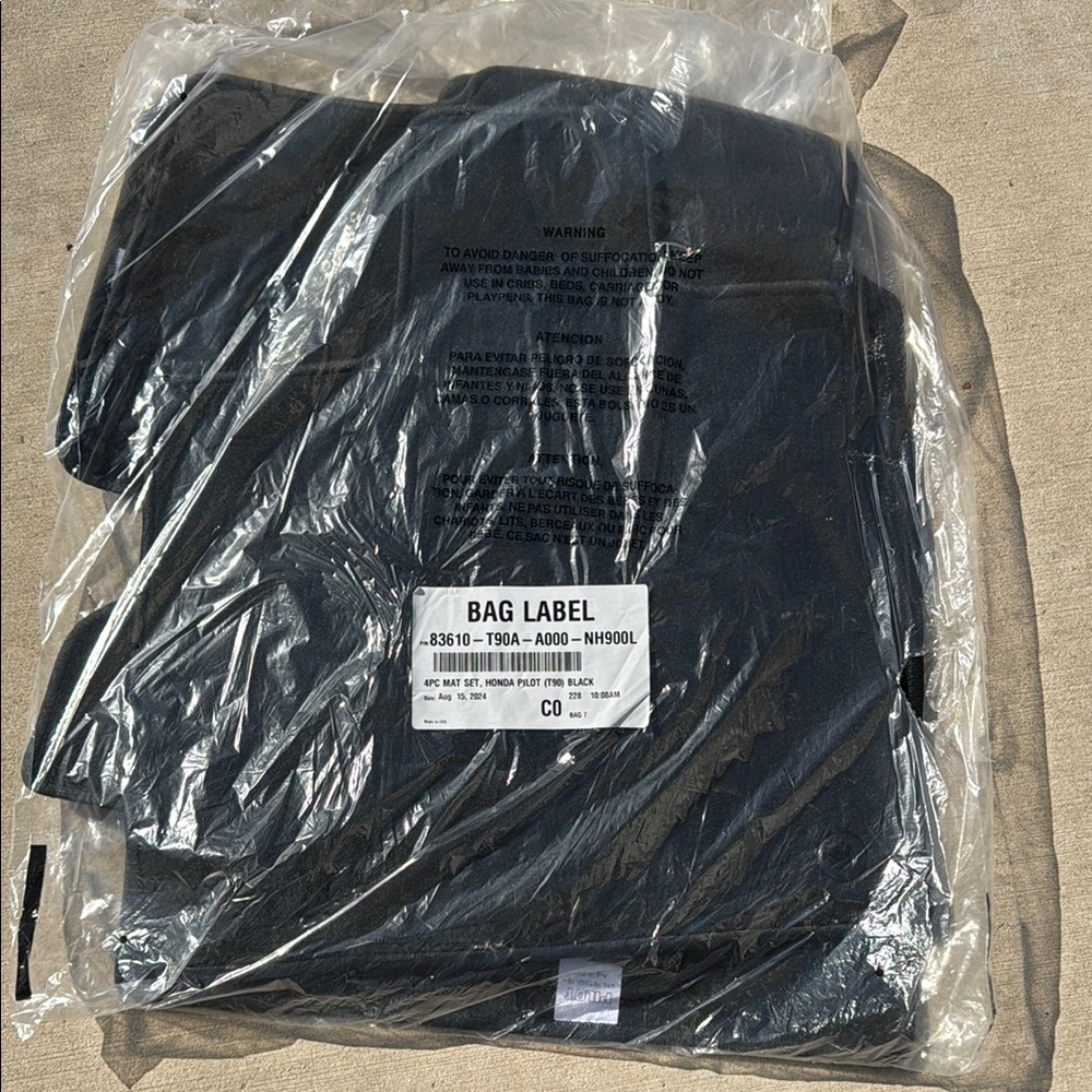 Honda Pilot black floor mats, new w tags